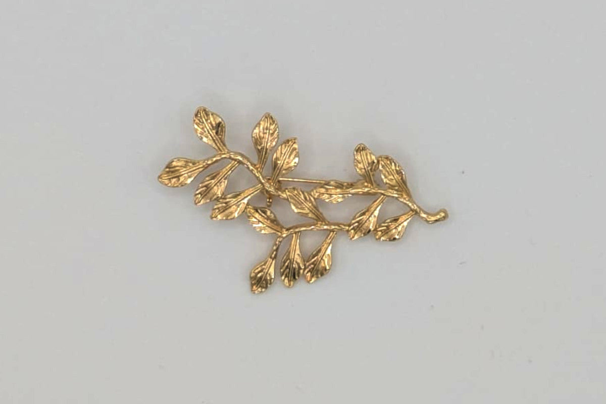 Broche flamenco dorado con forma de hojitas para niña, ideal para mantoncillos en ferias y romerías - MiBebesito