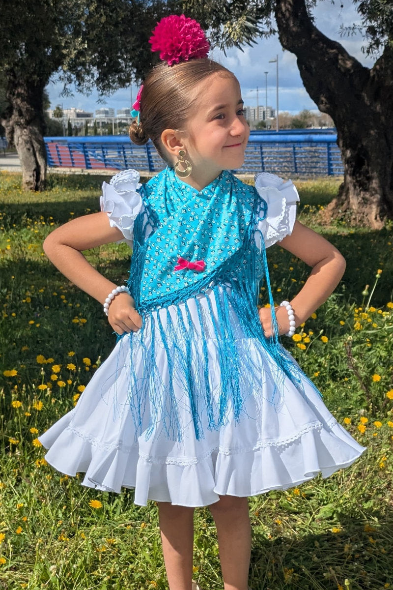 Mantoncillo niña estampado azul fleco ducado Cantillana - MiBebesito